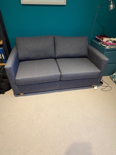 Two seater sofa bed with