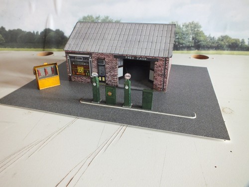 Garage with petrol pumps - , and