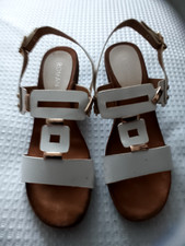 Stylish white sandals, size 6 from Roman.