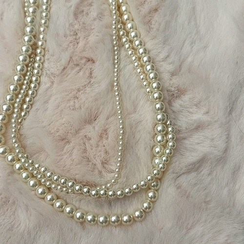 Layered white glass pearls - layered,