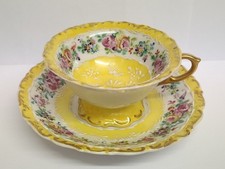 LIMOGES BONE CHINA ROSES CUP & SAUCER.