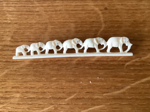 Vintage row five elephants - row,
