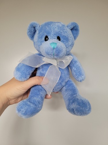 Tesco 2009 blue sitting - 2009,