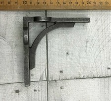 PAIR OF CAST IRON RADIATOR LUG