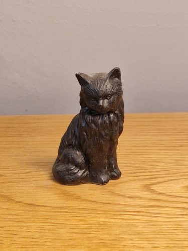 Coal sculpture cat figurine - sculpture.,