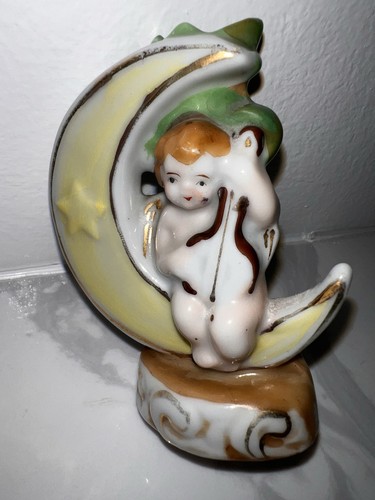 Vintage cherub playing - ‘cherub,