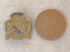 A 1932 - 68 pattern Girl Guides brass trefoil promise badge, mkr Charles Boyton