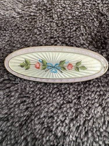 Silver and enamel brooch - and,