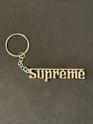 Supreme grand prix keychain - grand,