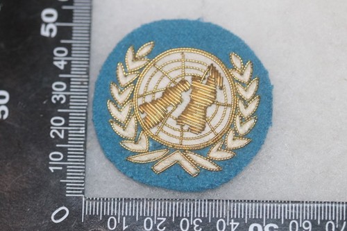 United nations beret badge - nations,