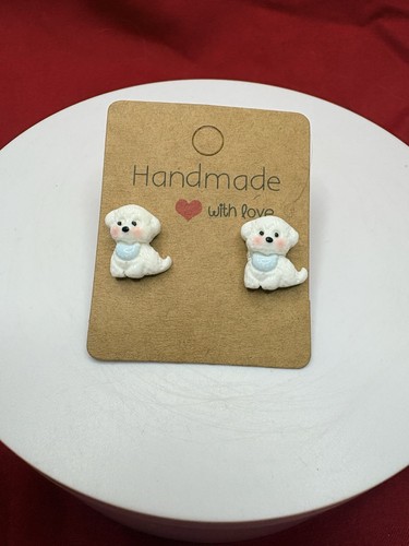 Bichon puppy with blue - with,