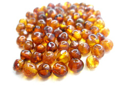 REAL BALTIC AMBER HOLED LOOSE