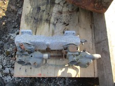 Vintage Solex 30FHD twin carburettors on Triumph inlet manifold