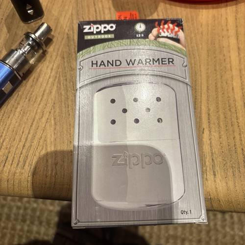 New zippo hand - zippo, warmer