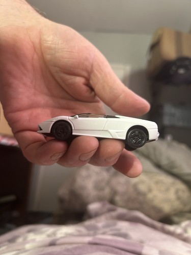Unknown white lamborghini toy - white,