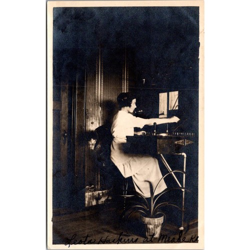Woman working a telephone - a,