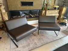 Pair of Ex showhome Kesterport brown leather contemporary lounge chairs rrp£4200