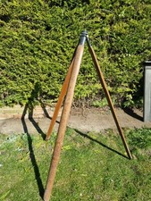 antique theodolite tripod