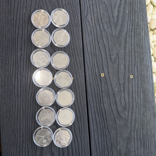 Olympic pence coin - pence,