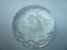 Clear glass dome shaped paperweight with irish harp and shamrock (81)