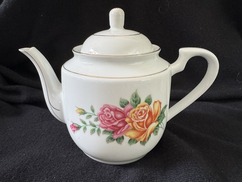 Vintage porcelain teapot with