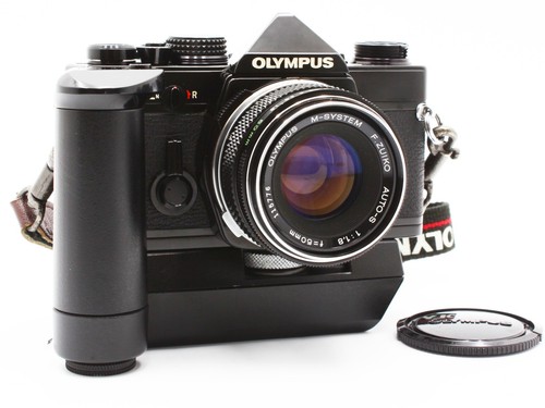 Olympus black 35mm slr - black,