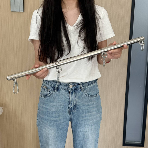 Adjustable open leg spreader - adjustable, open‑leg