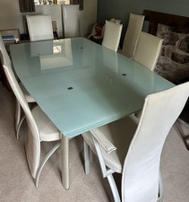 Italian Design Glass Dining Table And Eight Matching Cream Leatherette Chairs 