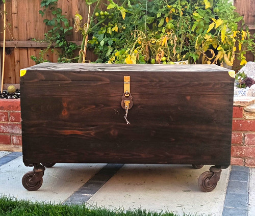 Dark stained wooden storage - stained,