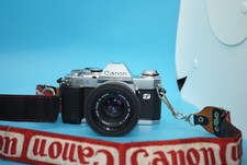 Canon AL-1  QF SLR 35mm Film Camera & 50mm F/1.8 FD Lens. 