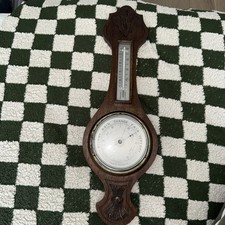 Edwardian British made oak cased aneroid barometer and thermometer