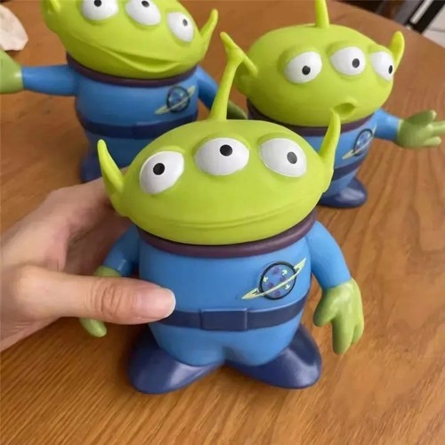 Green three eyed alien - three,