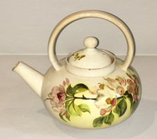 Early Linthorpe pottery teapot with lid floral design