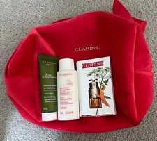 Clarins Beauty Travel Size Plus Bag Eye Serum, Cleanser (50ml) Shower Gel (30ml)