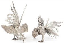 Two white metal fighting