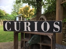 Curios Curio Sign plaque