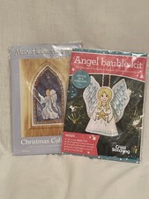 Two small angel cross - angel,