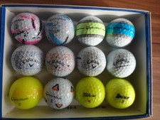 12 coloured pick ups grade A or better, Taylor Made, Titleist, Srixon, Callaway