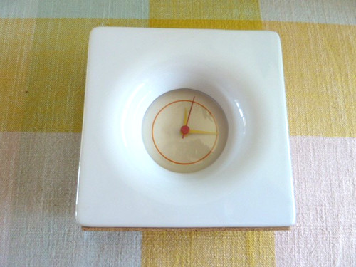 White pottery clock in - pottery,