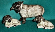 A Sheep Porcelain Figure With 2 Lambs