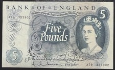 Old five pound note near - five,