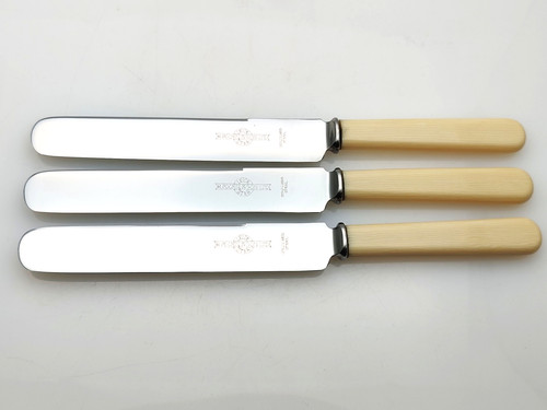 Faux bone handled - bone,