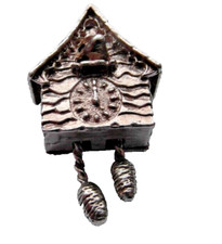 old antique silver charm of a