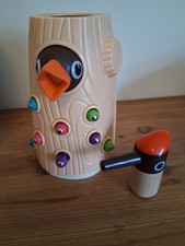 Top bright wooden Woodpecker