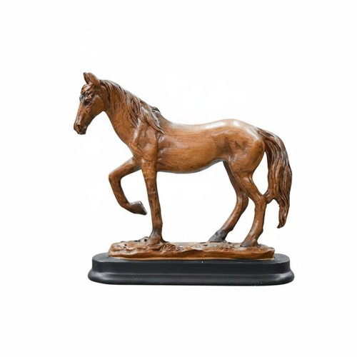 Golden horse figurine symbol - golden,