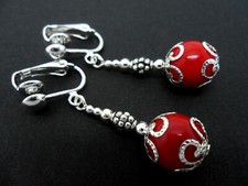 A PAIR OF DANGLY JADE CLIP ON