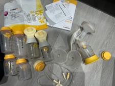 Medela Freestyle Breast Pump bottles, shields, bag and manual breast pump,