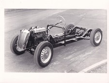 MGA TF ROLLING CHASSIS PHOTOGRAPH, BRITISH LEYLAND STAMP TO REAR OF PHOTO.