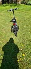 adult sit on electric scooter