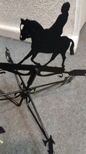 vintage esquarian weather vane